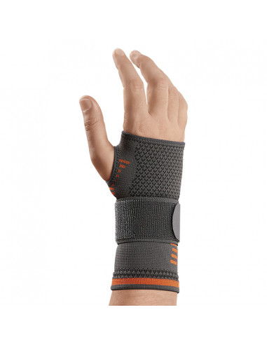 Muñequera elástica con cincha para la tendinitis de la mano.